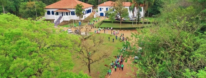 Aerial photo of the Paulinia site with people gathered outside.